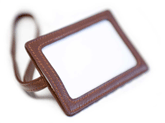 brandy colored luggage tag with long strap