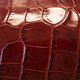 red crocodile grain glazed leather swatch